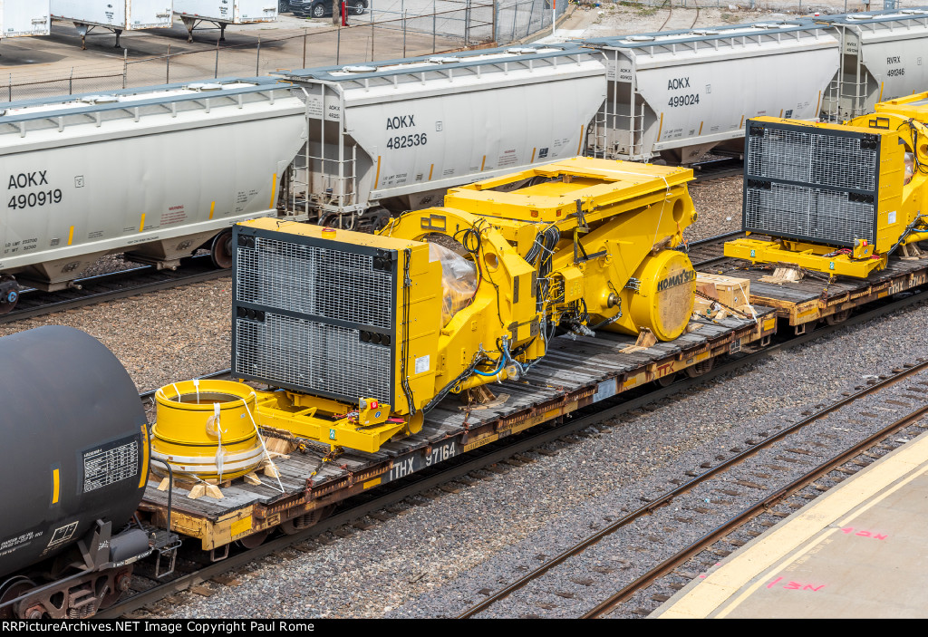 TTHX 97164, 60-ft flat car with Komatsu equipment load on BNSF